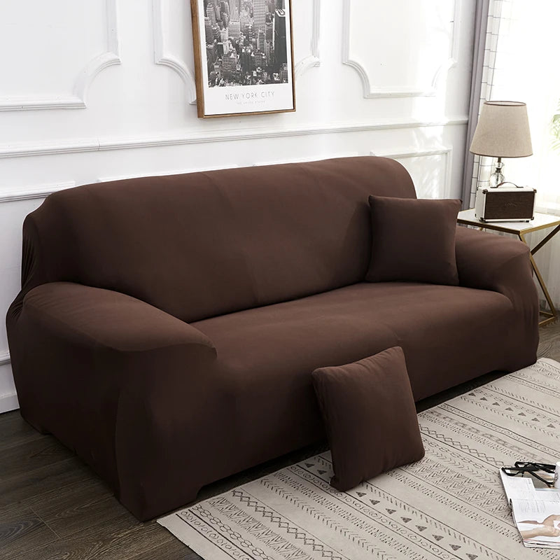 A dark brown elegant faux silk sofa cover placed on a light rug in a well-lit room.