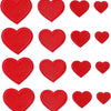 A collection of 24 iron-on love heart embroidered patches in red.