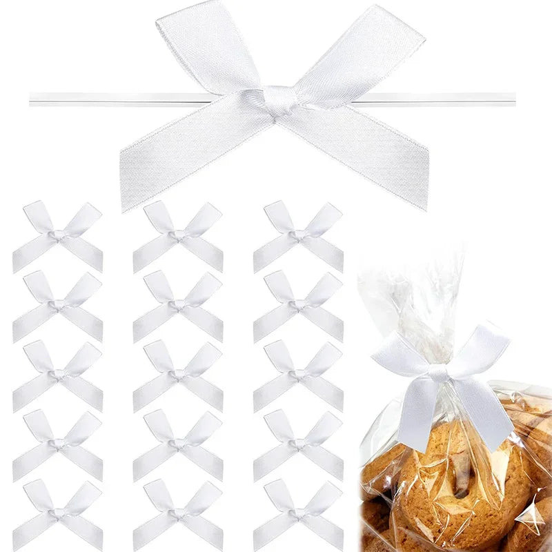A collection of white satin ribbon twist tie bows arranged in a grid and tied on a stick.