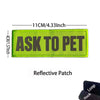 Lime green reflective patch with black text that reads ASK TO PET