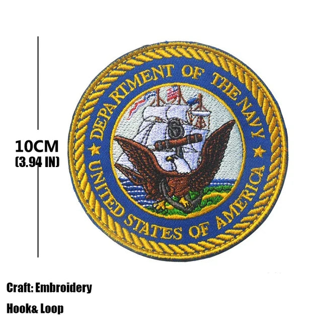Embroidered patch featuring the Department of the Navy seal and United States of America text on a gold fabric background