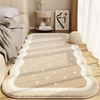 A beige seasonal decor rug with subtle geometric patterns placed on a light wooden floor.