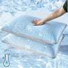 A hand is placing a light blue ice silk cooling pillowcase onto water, with ice shards visible in the background.