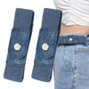 Navy blue stretchable elastic belt with a plaid pattern worn over light blue denim jeans.