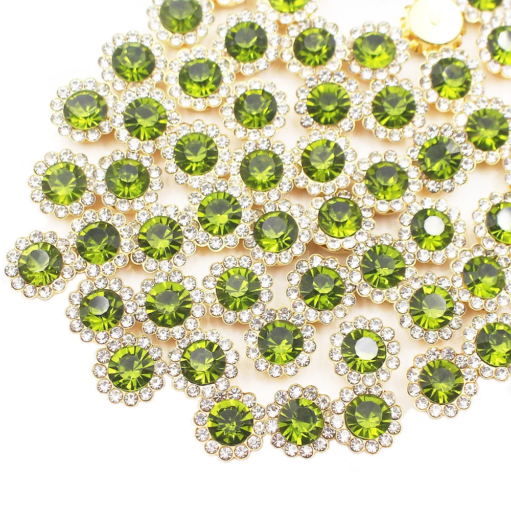 A close-up of sunflower crystal rhinestone sew-on buttons in various shades of green and clear stones.