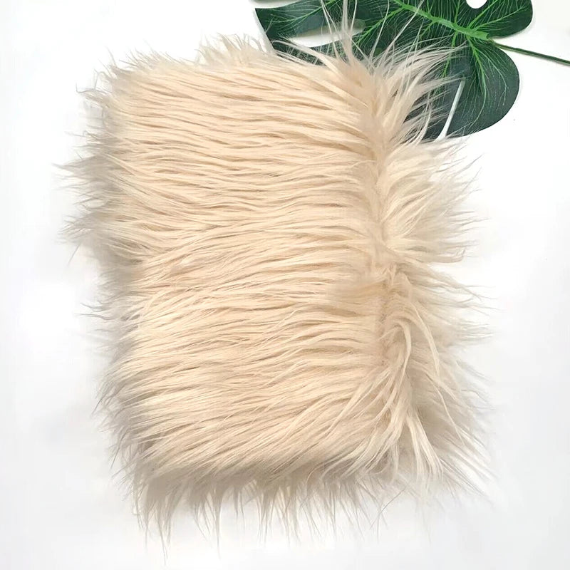 Light beige faux fur plush fabric used for sewing and crafting