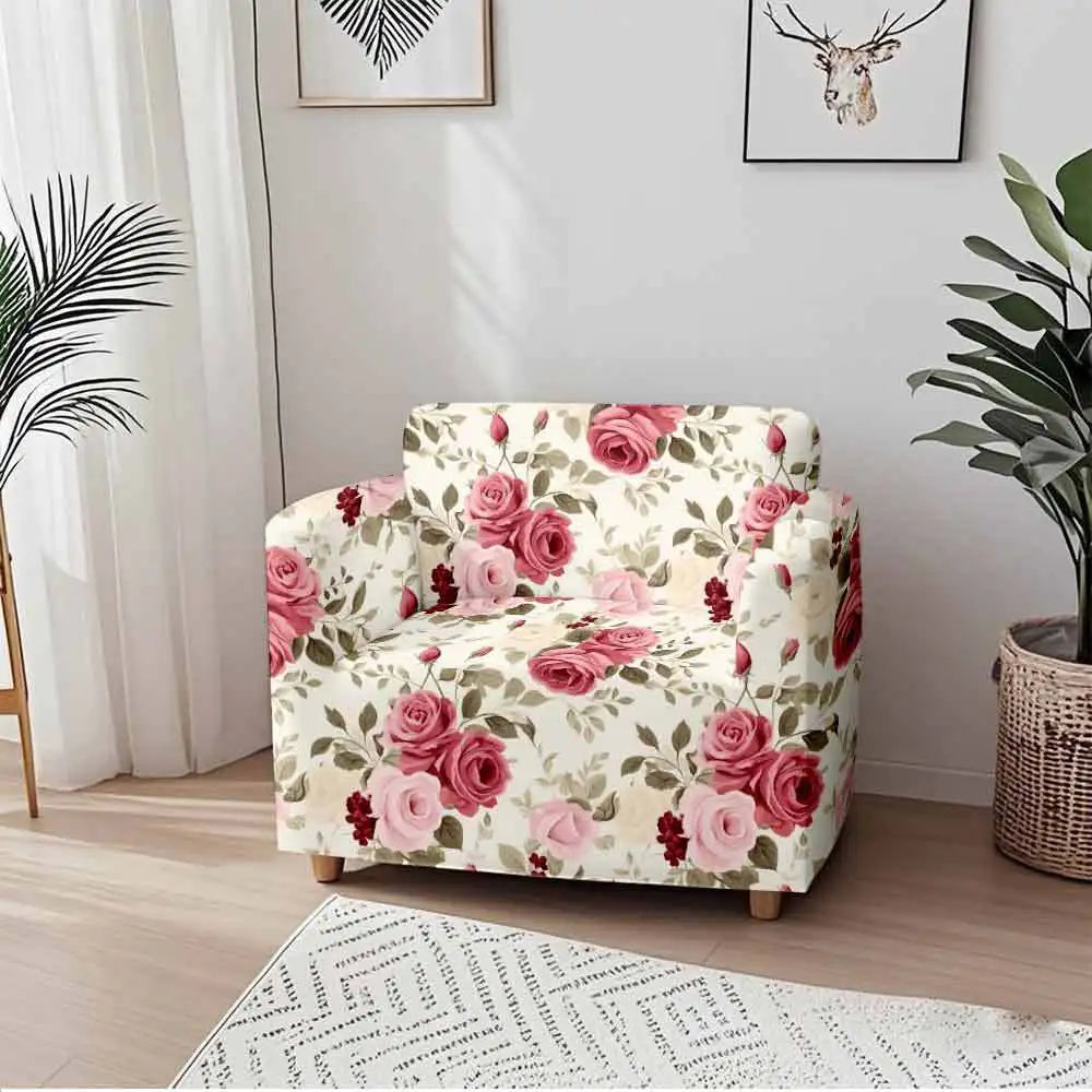 A floral patterned sofa cover featuring pink roses and green leaves displayed in a bright room.