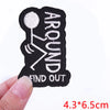 Black embroidered patch with white text that reads Around Find Out