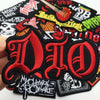 A set of embroidered iron-on patches featuring the stylized letters D I O in red and black on a black fabric background.