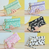 A collection of purple, green, and black PU leather coin purses with wrist straps shown in various angles.