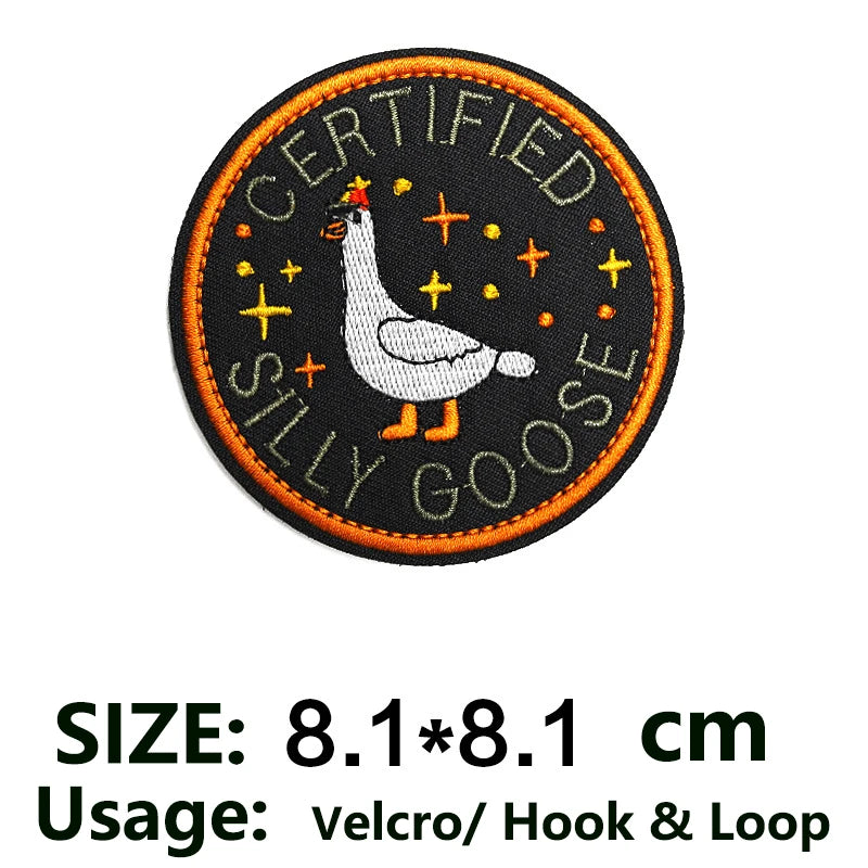 Black embroidered patch with yellow stars and text Certified Silly Goose on the Loose
