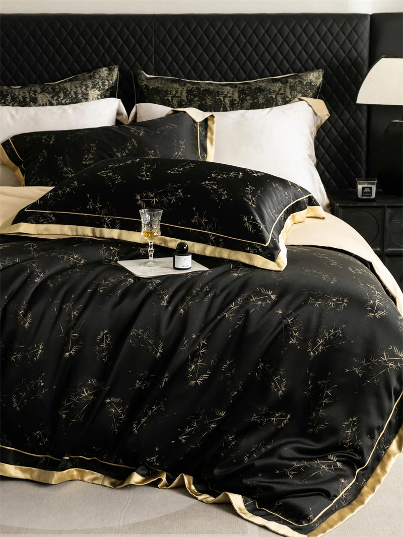Black and gold luxury lyocell bedding set featuring a quilted headboard and pillows.