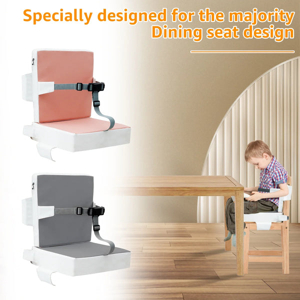 A pink memory foam booster seat with a safety belt is shown next to a gray version in a dining chair context.