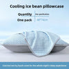Light blue cooling ice bean pillowcase rolled up on a white surface.