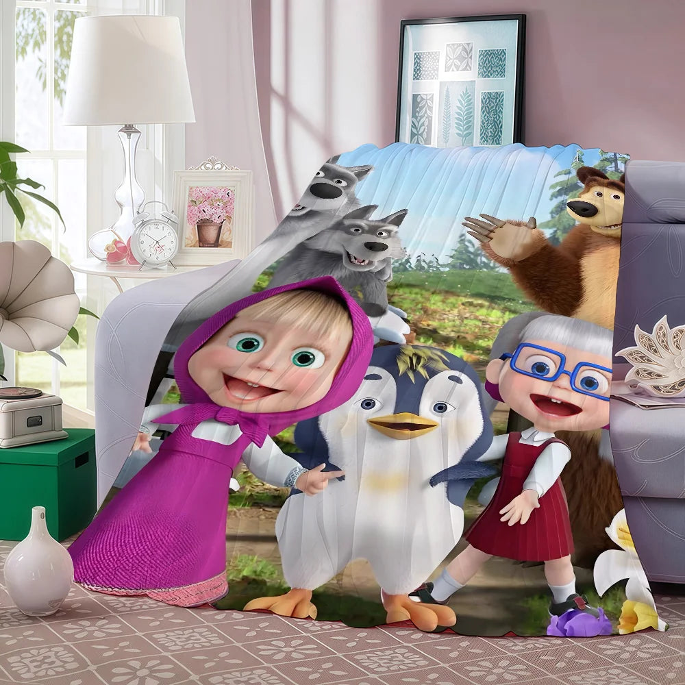 A fleece blanket featuring characters from the Masha cartoon including Masha and other animals.