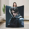 A dark graphic print featuring a male character with silver hair and intense expression, held by a woman.