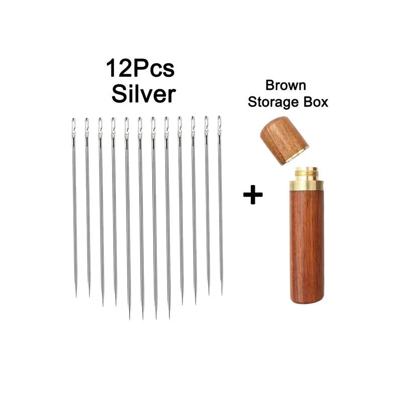 A set of 12 silver stainless steel sewing needles and a brown storage box.