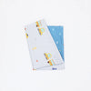 A light blue and white baby pillow cover featuring colorful geometric designs and a blue fabric.