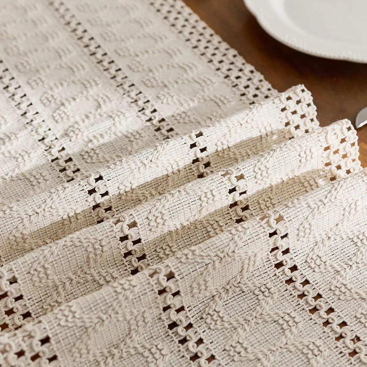 Beige boho hand-woven table runner with intricate lace detailing