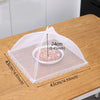 A clear mesh insect and fly protection cover is shown with a bowl inside, demonstrating its size.