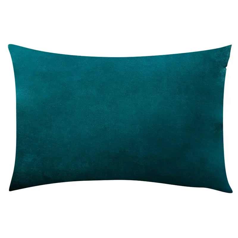 A dark teal velvet throw pillow cover with a soft texture.