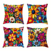 Four vibrant floral patterned decorative pillow covers featuring bright colors and diverse flower designs.