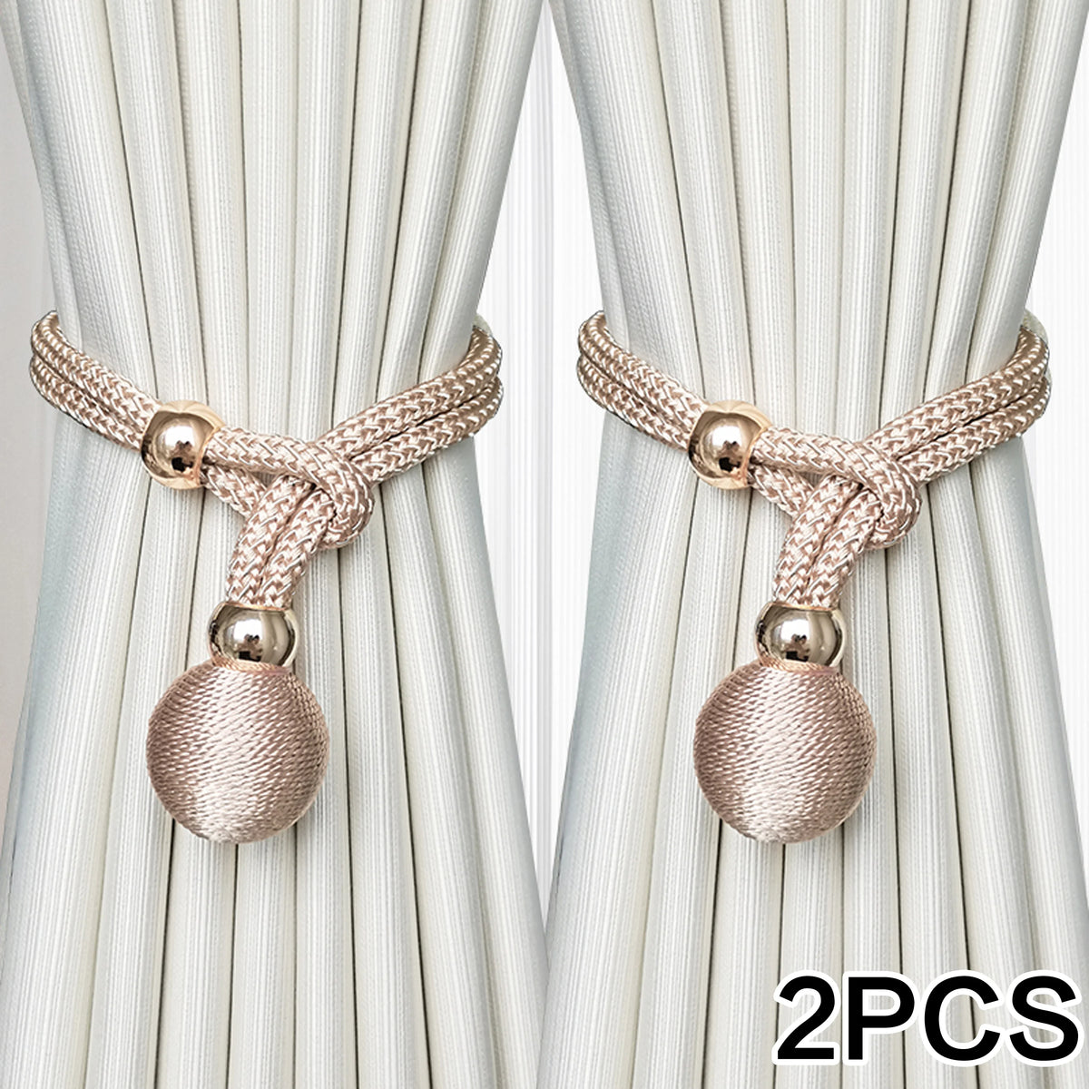 Two pairs of beige silk curtain tiebacks with gold accents and braided cord