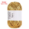 A skein of metallic gold T-shirt yarn for crochet and DIY crafts.