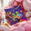 A square pillow cover featuring a vibrant, colorful illustration of a green car and smiling slime characters on a purple back
