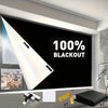 A large flat-screen TV is shown with a 100% blackout screen display, next to a set of DIY blackout window curtains.
