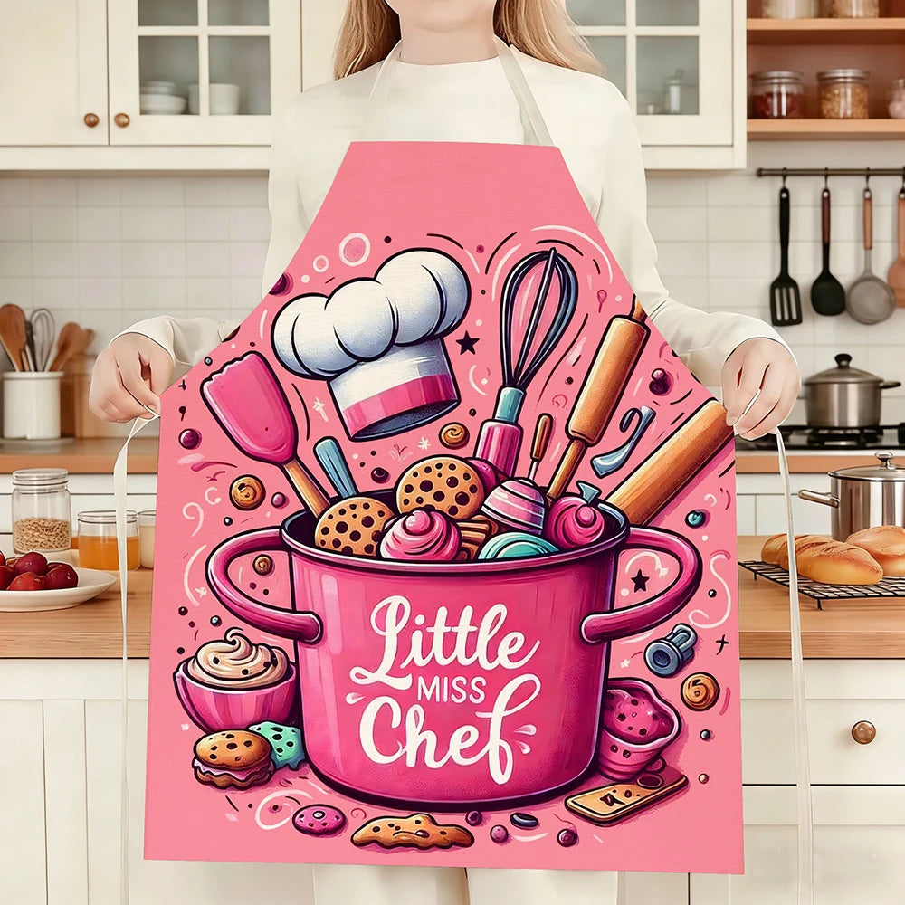 Pink kitchen apron featuring a baking design with various pink and colorful baked goods.
