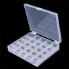 A clear plastic storage case for a 25-piece set of sewing machine bobbins with individual compartments.