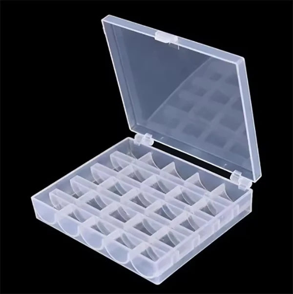A clear plastic storage case for a 25-piece set of sewing machine bobbins with individual compartments.