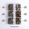 A clear plastic tray containing various sizes of gold and dark brown glass rhinestones categorized by SS6, SS10, SS10, SS20, 