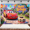 A Disney-style cartoon race car is featured in a birthday party backdrop with colorful balloons and festive decorations.