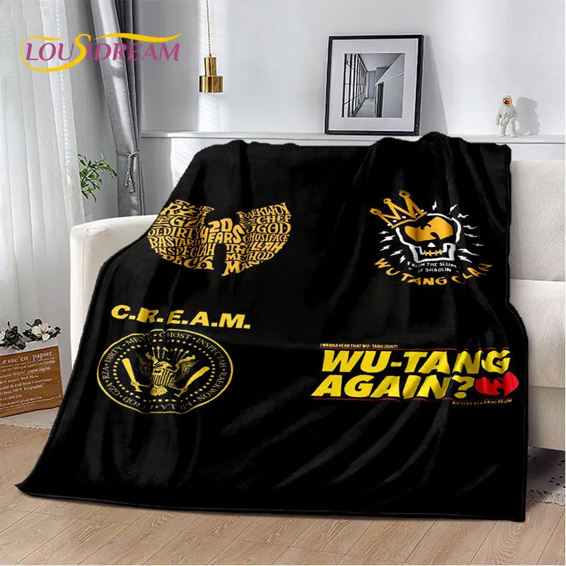 Black flannel throw blanket featuring a gold-toned design with the text WU-TANG AGAIN