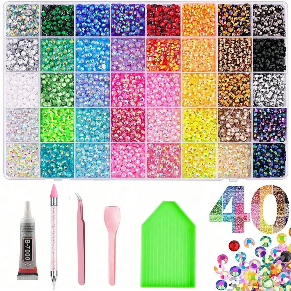 A variety of colorful resin rhinestone kits, tools, and glitter are displayed for crafting and decoration.