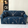 A deep navy blue sofa slipcover featuring a gold geometric star pattern.