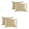 A set of two smooth, champagne-colored satin silk pillowcases.