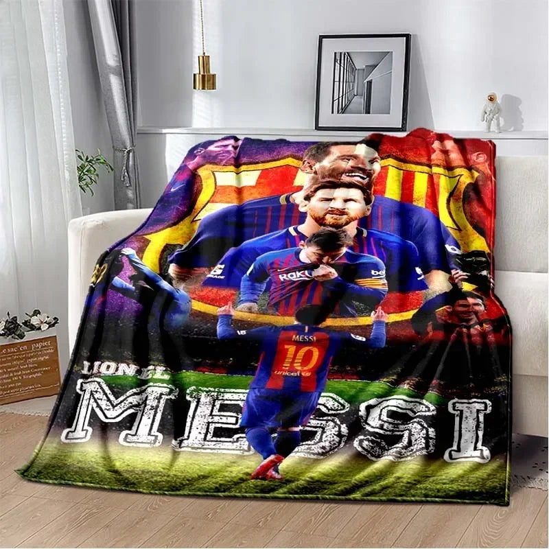 A large blanket featuring images of Lionel Messi in various poses and a soccer theme.