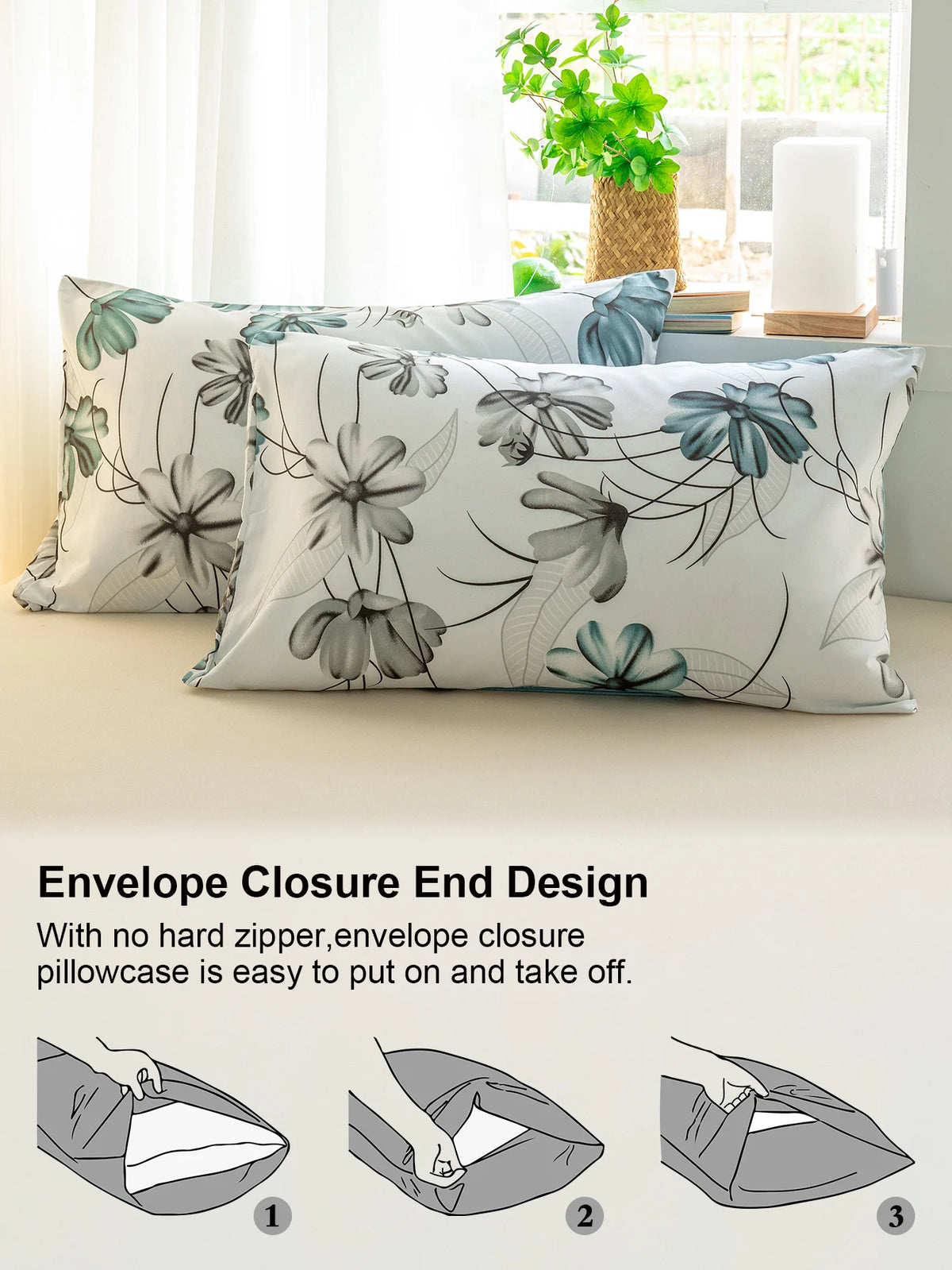 A close-up of a pillowcase featuring a watercolor floral pattern in teal and grey tones.