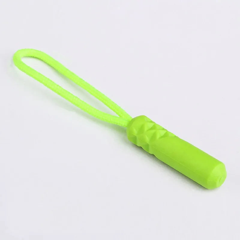 A bright lime green zipper pull replacement clip with a flexible loop and a cylindrical body.