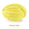 A ball of extra thick hand-knitted yarn in the color Warm Yellow.