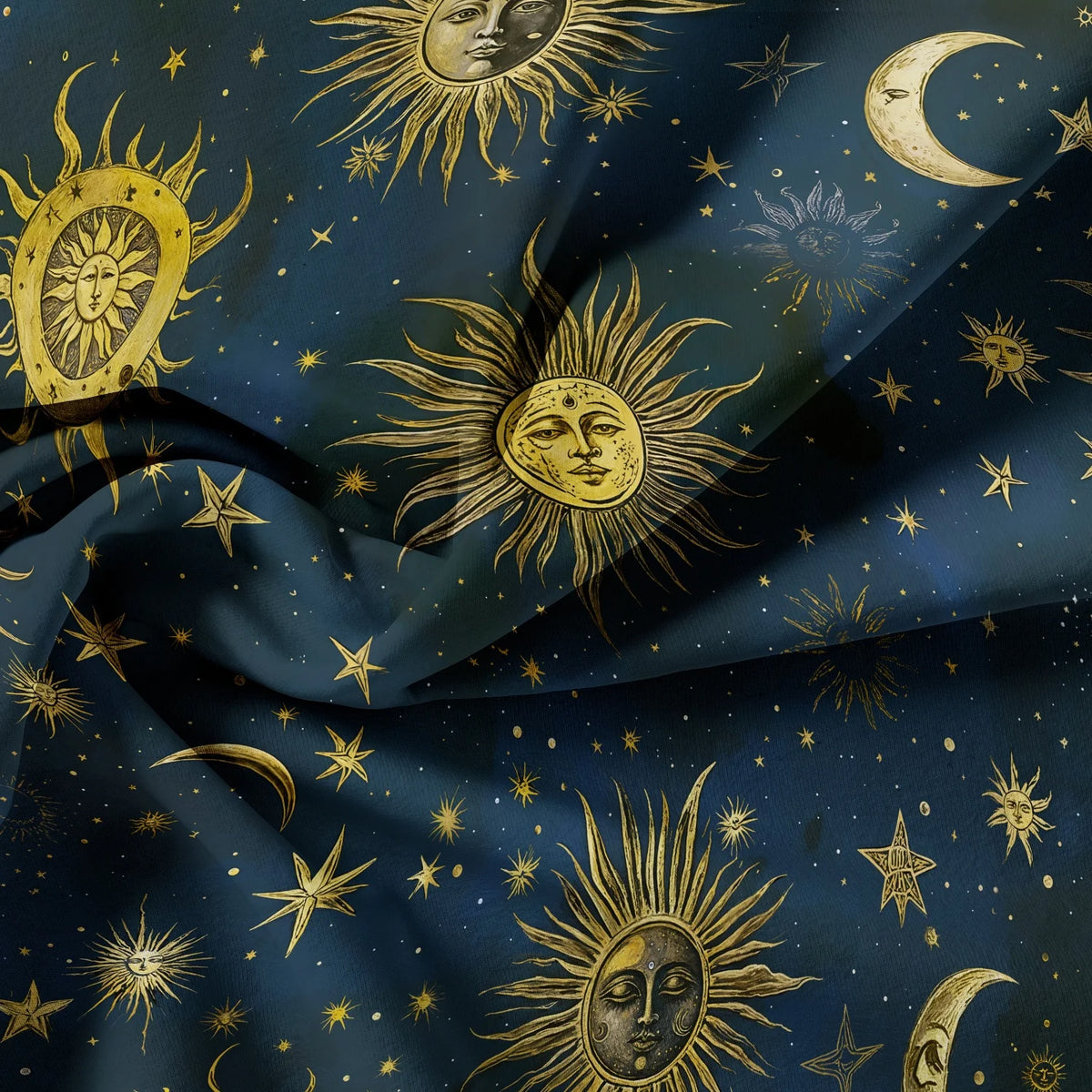 Dark blue fabric featuring a celestial pattern of suns, moons, and stars in gold.