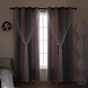Grey-pink gradient star perforated curtains hanging in a window with sheer fabric.