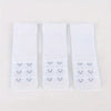 Three white adjustable bra extender straps laid out side by side.