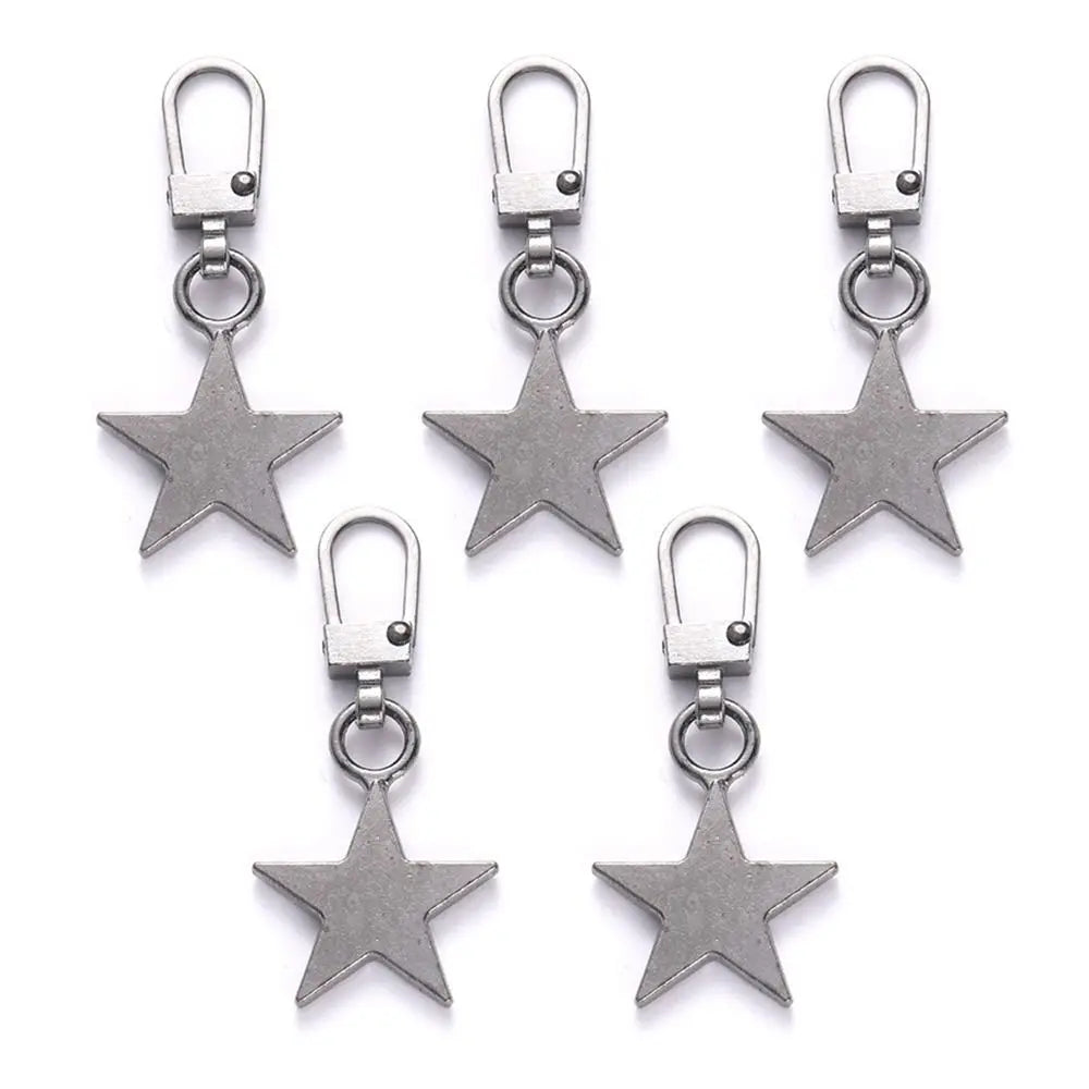 A set of five silver metal zipper pull replacement kits with jump rings