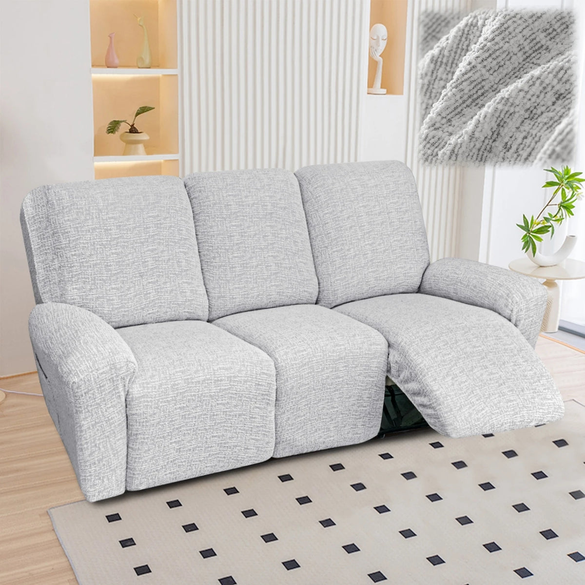A light gray heavy-duty chenille recliner sofa slipcover placed on a wooden floor.