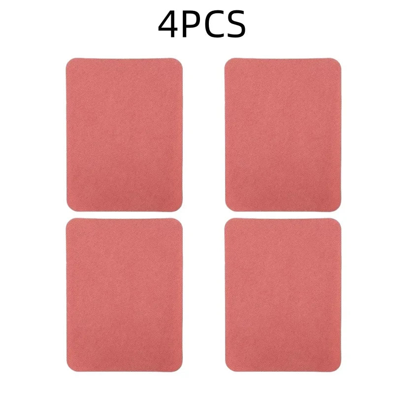 A set of four pink iron-on fabric repair patches.