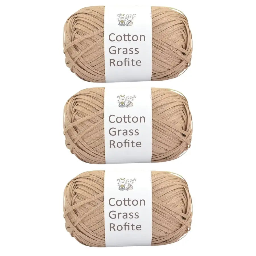 A set of natural cotton grass roving yarn in a light beige color, packaged with white labels.